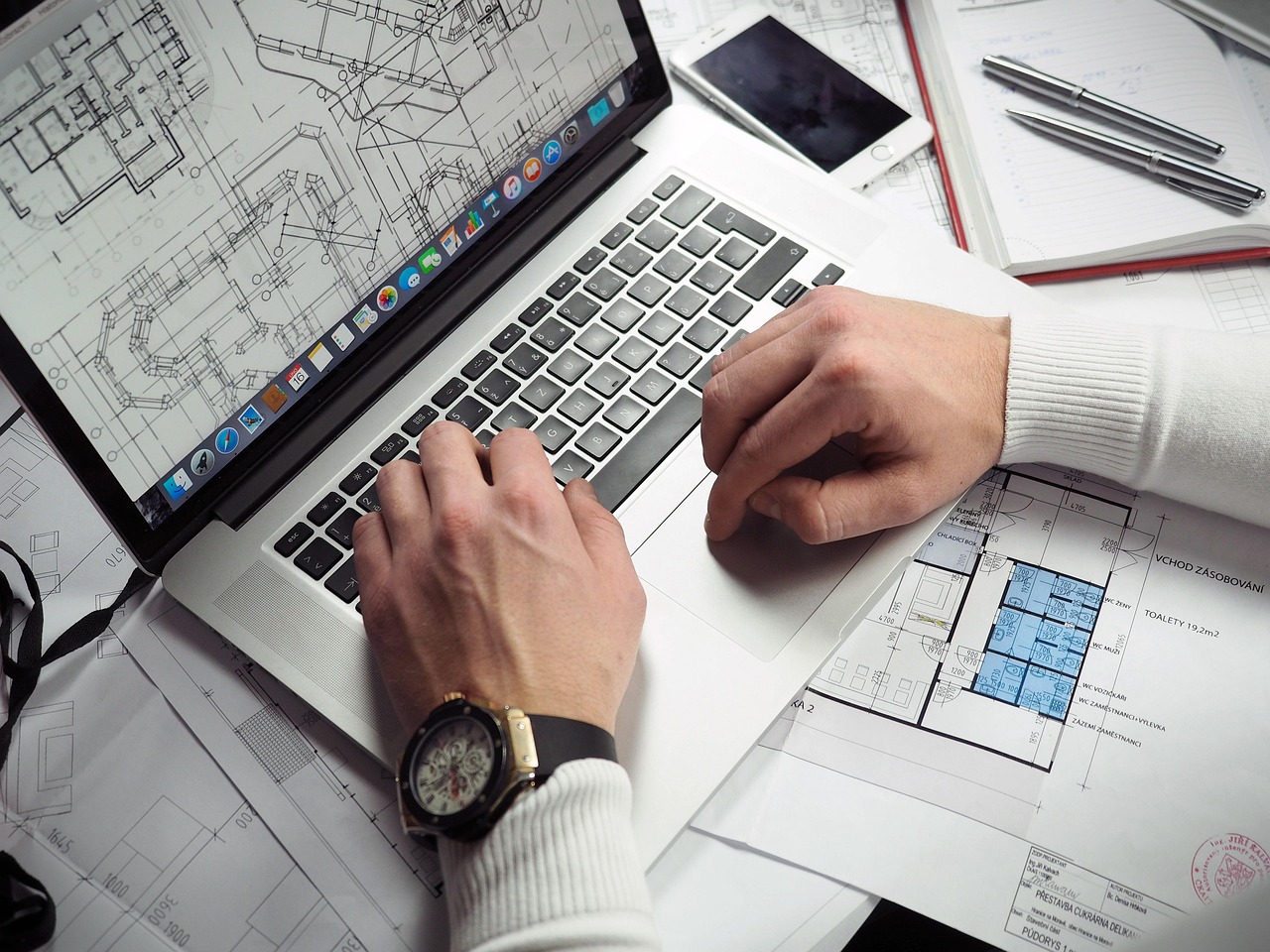Blueprints, entrepreneur, hands — What is business mentoring?
